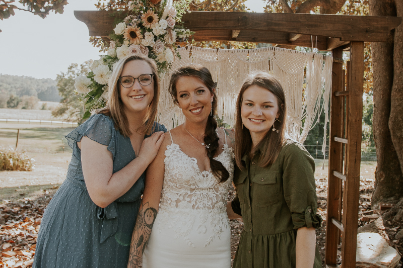 Ashley celebrates at her wedding with two Wellstar nurses, Tayla Lee and Emily Haytas.